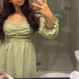 green puffy long sleeve dress